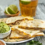 This is a picture of a plate of carnitas quesadilla.
