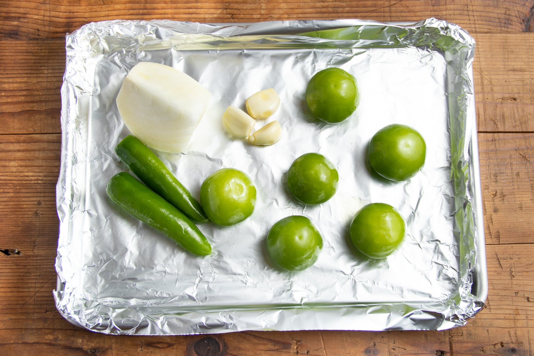 This is a picture of all the ingredients on a baking sheet before roasting.