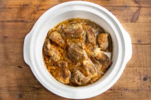 This is a picture of the pork carnitas in the slow cooker after it's cooked.