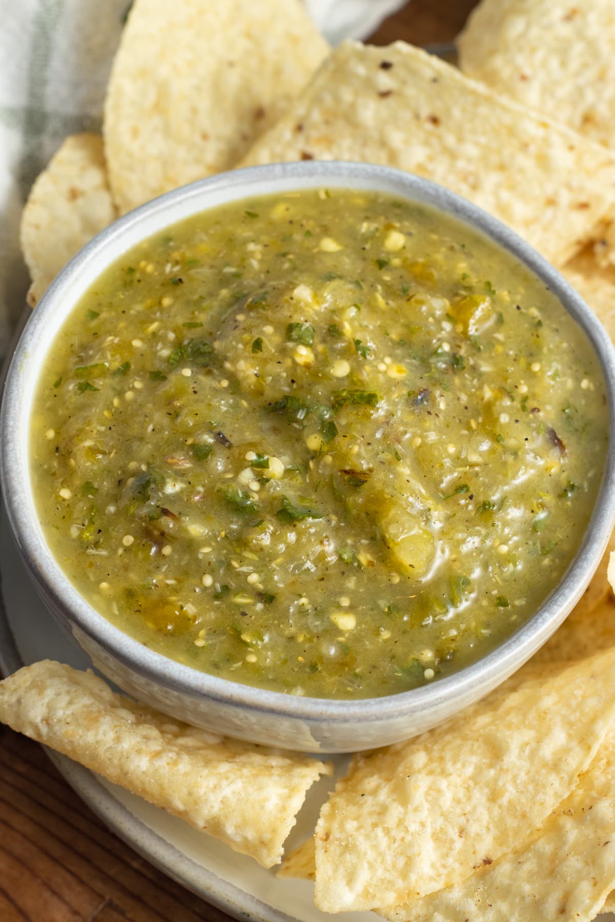 This is a picture of a bowl of fresh roasted tomatillo salsa.