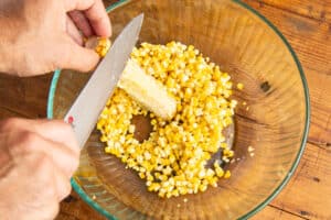 This is a picture of the corn being cut off the Cobb.