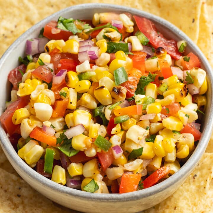 This a picture of a bowl of corn pico de Gallo.