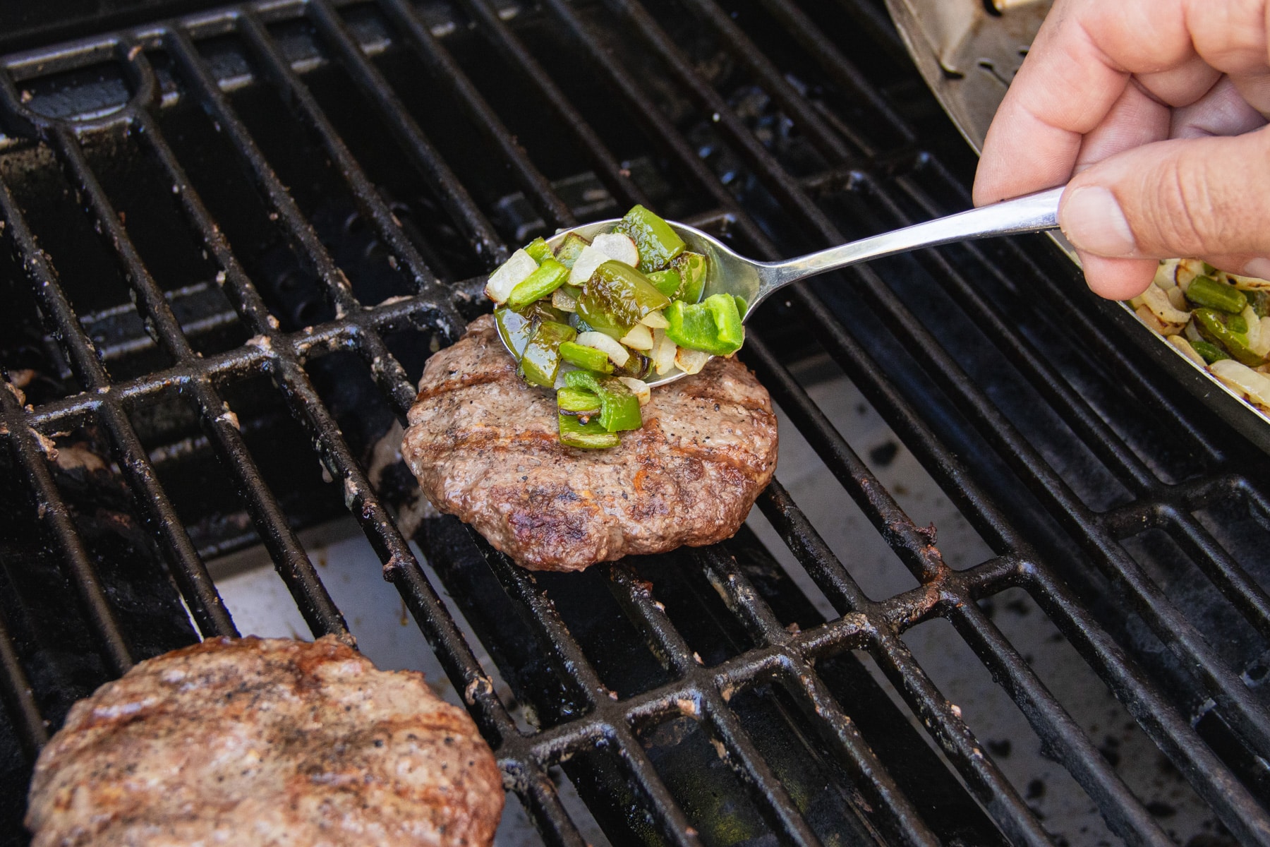 This is a picture of the veggies being added to the patty.