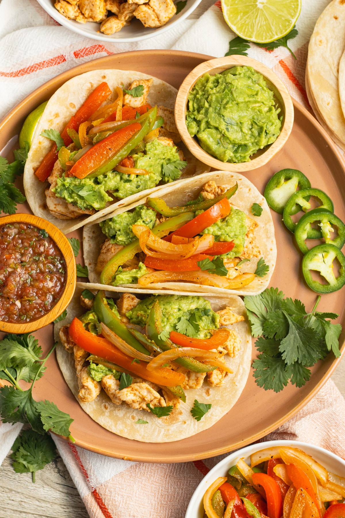 This is a picture of a plate of chicken fajita tacos.