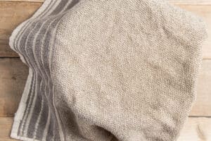 This is a picture of the bowl with the peppers covered with a towel.