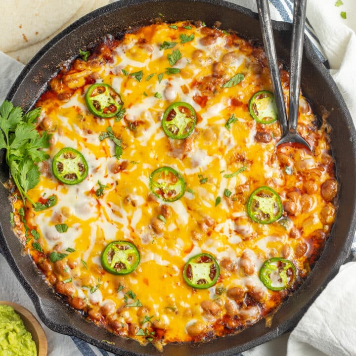 This is a picture of a skillet with chorizo and beans.