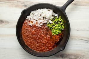 This is a picture of the chorizo onion and jalapeño in a skillet.